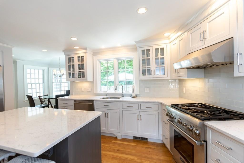 11 Arnold Road Wellesley, MA 02481 - Photo 11 of 33 a kitchen with stainless steel appliances stove refrigerator sink and cabinets