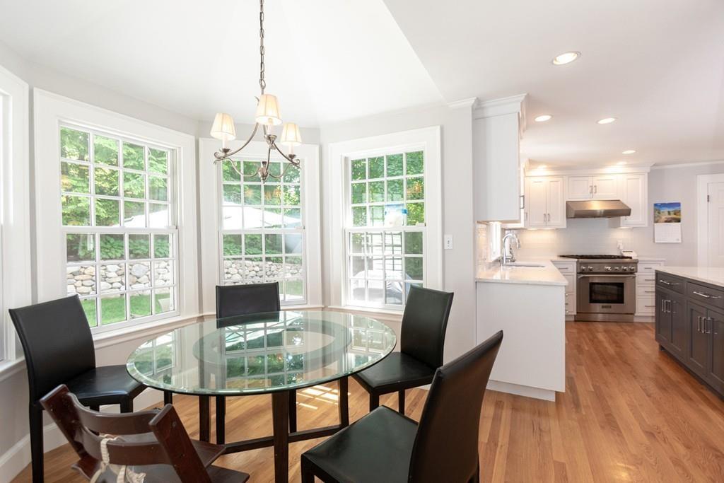 11 Arnold Road Wellesley, MA 02481 - Photo 15 of 33 a view of a dining room with furniture window and wooden floor