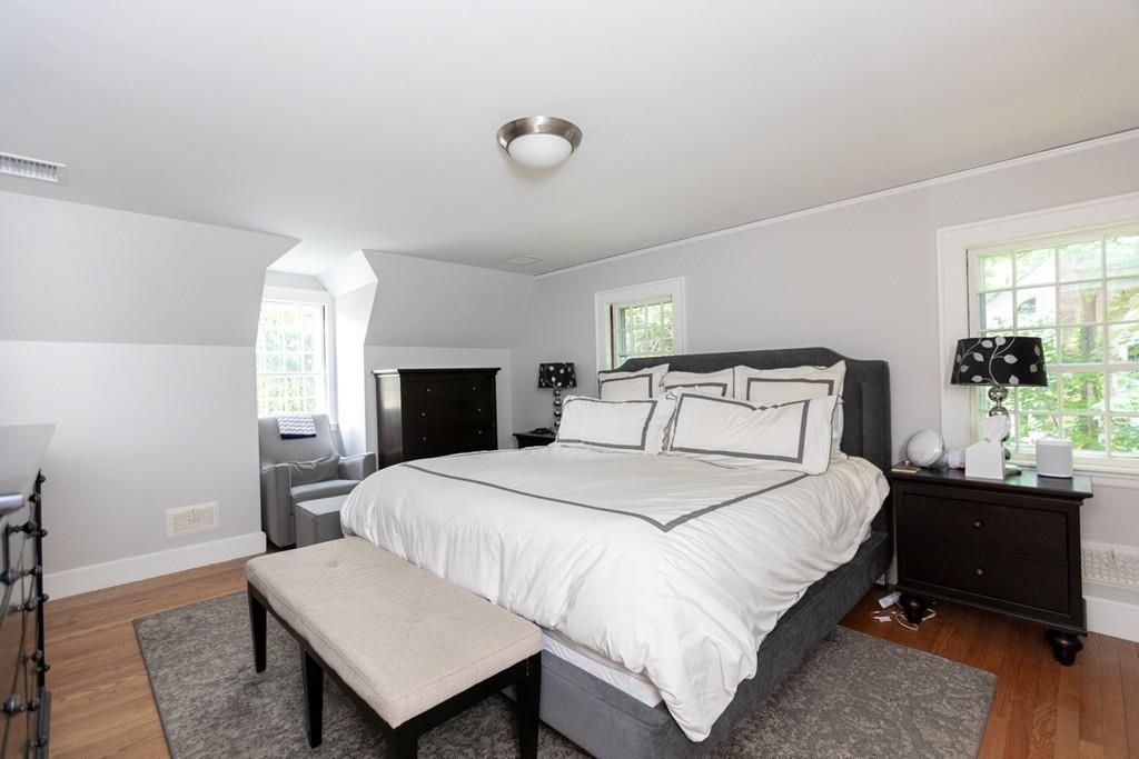 11 Arnold Road Wellesley, MA 02481 - Photo 20 of 33 a bedroom with a bed and a table