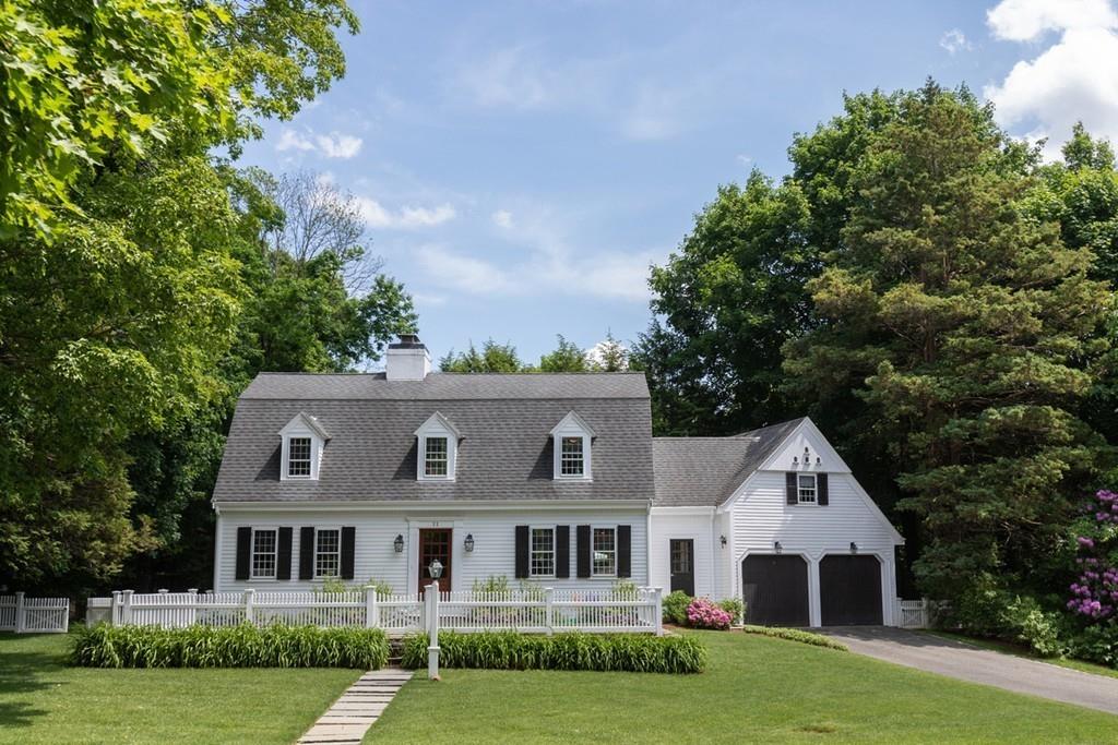 11 Arnold Road Wellesley, MA 02481 - Photo 2 of 33 a front view of a house with a garden