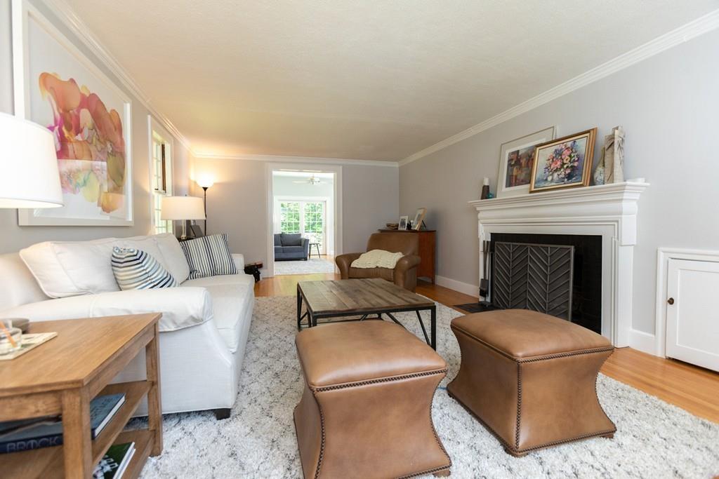 11 Arnold Road Wellesley, MA 02481 - Photo 7 of 33 a living room with furniture and a fireplace