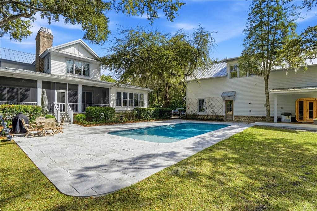 12 Tanglewood Road St. Simons Island, GA 31522 - Photo 2 of 65 Pool; rear elevation of mainhouse.