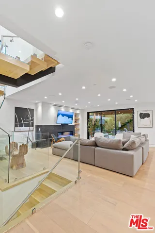 a kitchen with a table chairs and a stove