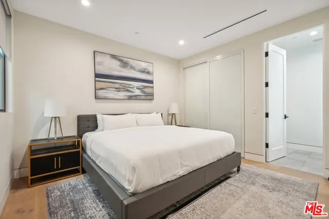 a view of a swimming pool with a lounge chair