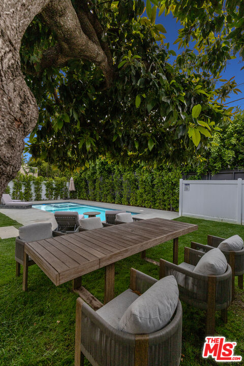 731 North Curson Avenue Los Angeles, CA 90046 - Photo 72 of 75 a view of house with backyard outdoor seating and green space