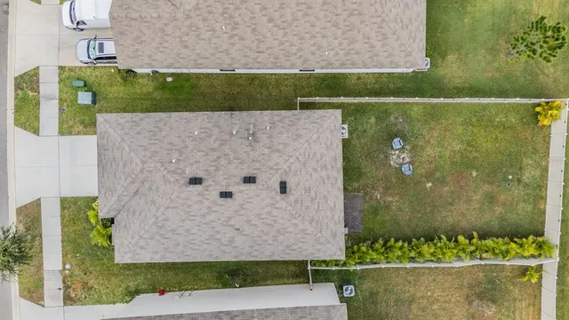 a view of a city with an ocean view