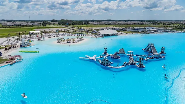 a view of a swimming pool with a garden