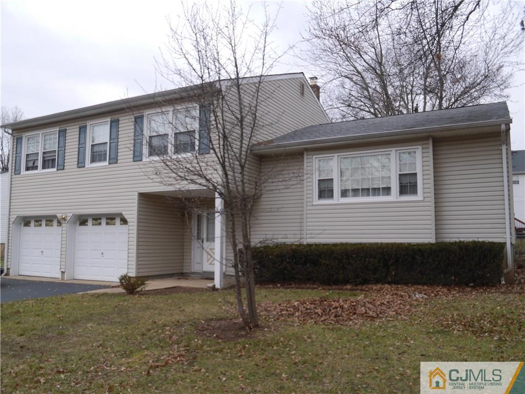 4 Meredith Road Edison, NJ 08817 - Photo 2 of 4 a view of a house with a yard