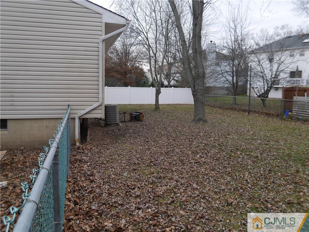 4 Meredith Road Edison, NJ 08817 - Photo 4 of 4 a backyard of a house with lots of green space