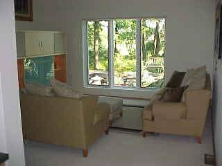 12 Anna Road Pocono Lake, PA 18347 - Photo 3 of 8 a living room with furniture and a window