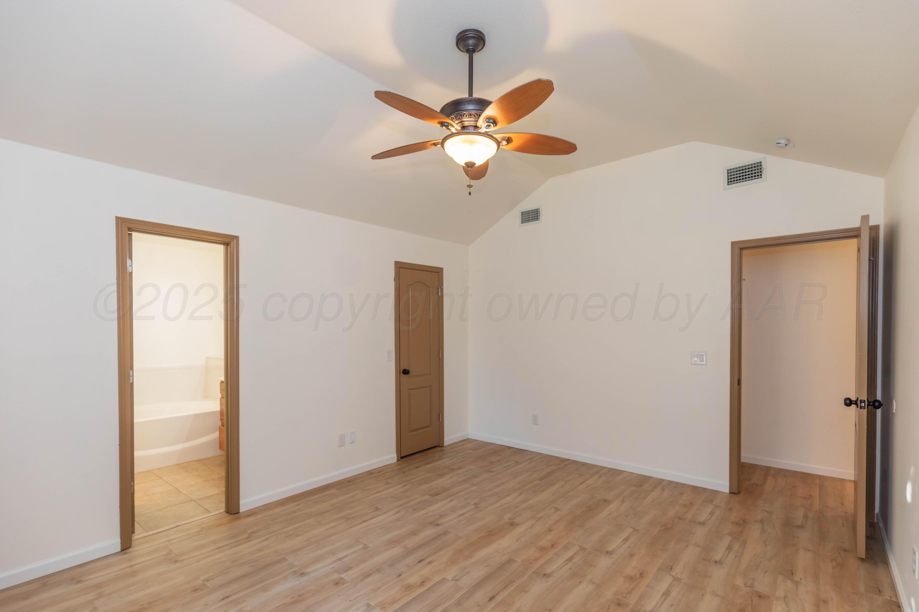 4810 Nimbus Lane Amarillo, TX 79110 - Photo 23 of 45 a view of a hallway with wooden floor