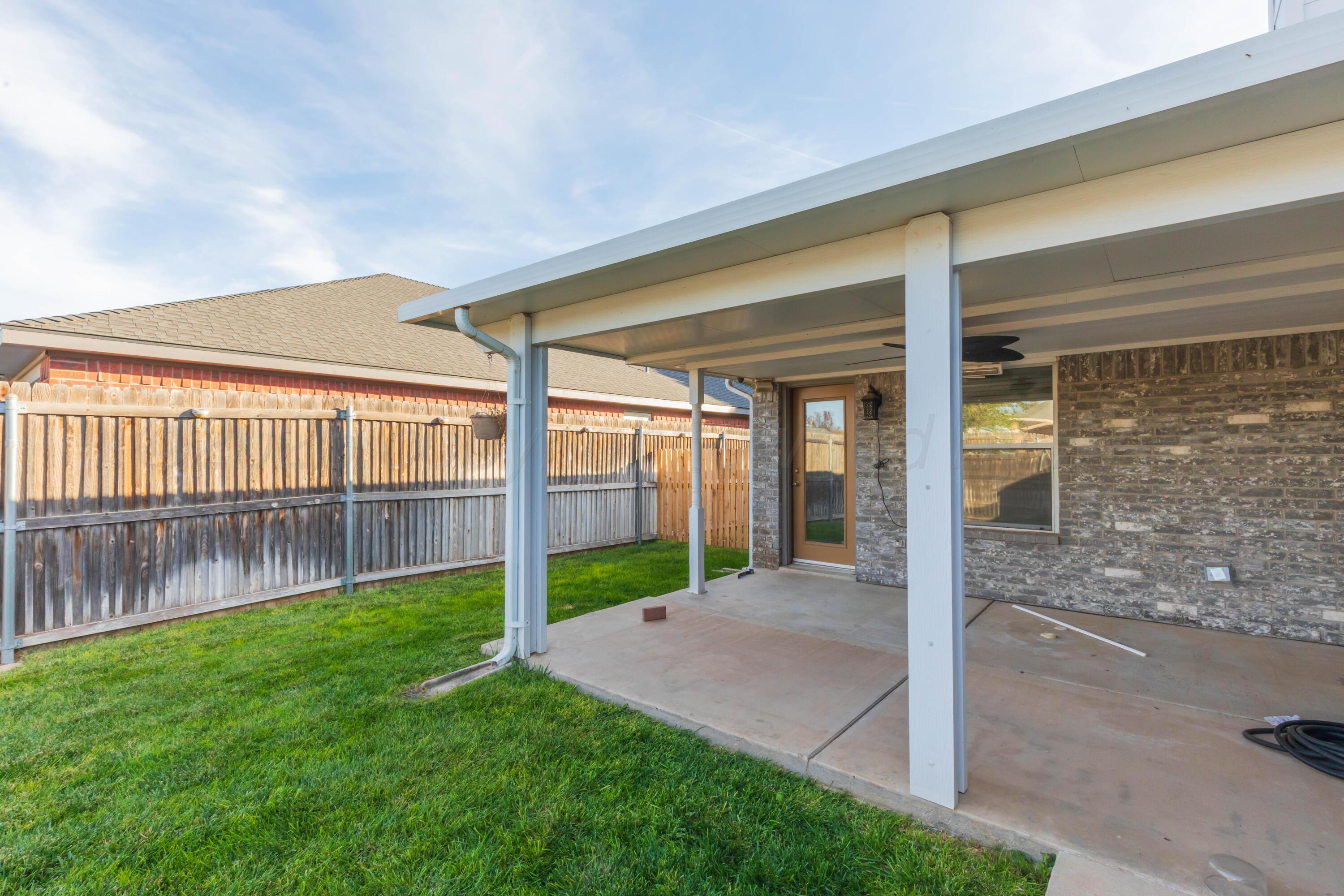4810 Nimbus Lane Amarillo, TX 79110 - Photo 42 of 45 a view of a porch with a backyard