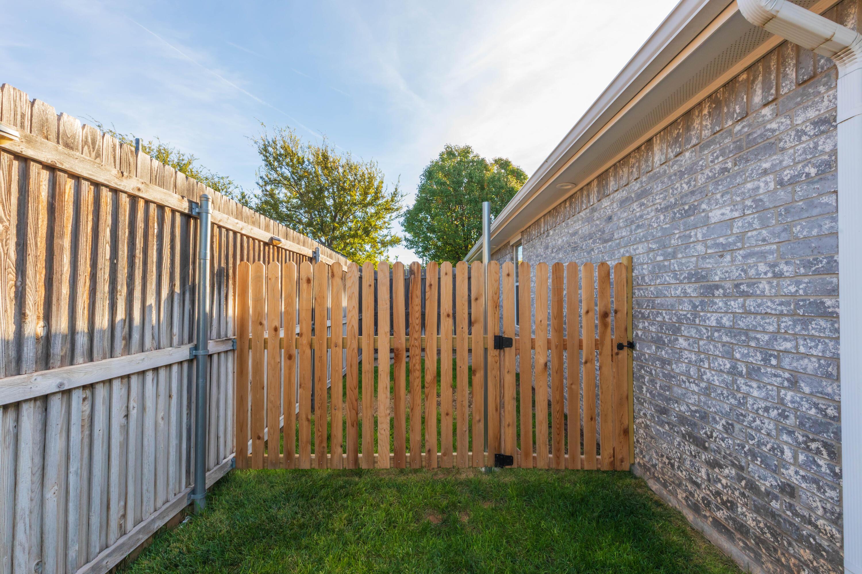 4810 Nimbus Lane Amarillo, TX 79110 - Photo 44 of 45 a view of a backyard with wooden fence