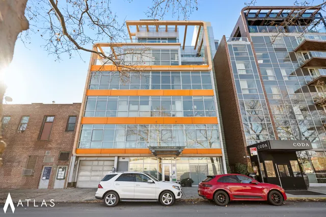 a outdoor living space with furniture and a flat screen tv