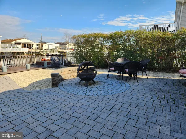 a view of a terrace with furniture