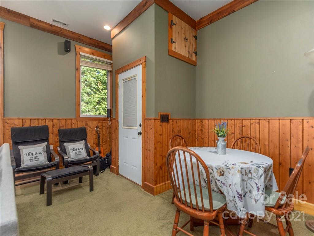 456 Walker Road Waynesville, NC 28786 - Photo 12 of 24 a bedroom with furniture and a window