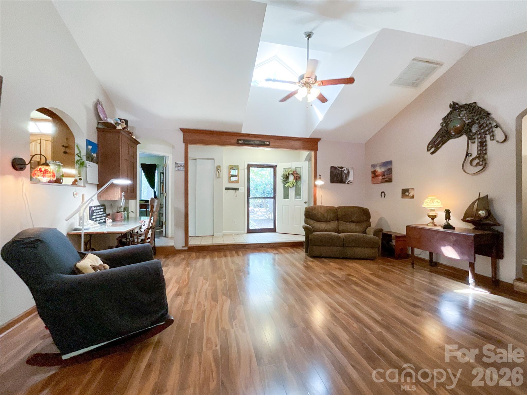 7200 Nesbit Road Waxhaw, NC 28173 - Photo 5 of 47 a living room with furniture and a wooden floor