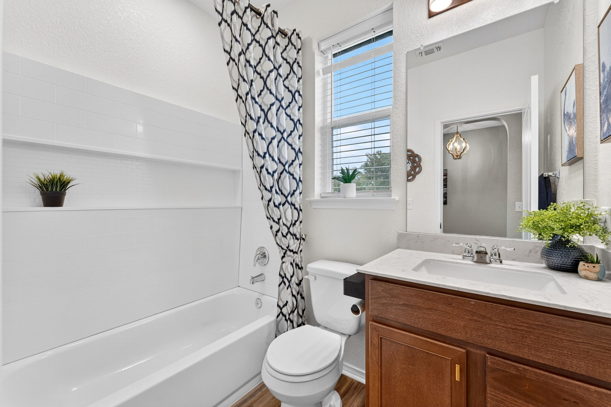 326 Linden Street Bastrop, TX 78602 - Photo 9 of 39 Downstairs full bath with silestone countertops.