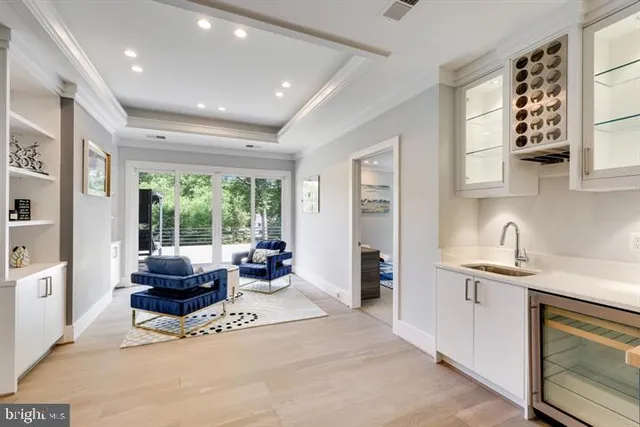 a bathroom with a sink toilet vanity and shower