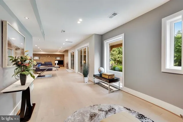 a bathroom with a sink a shower a mirror and a bathtub