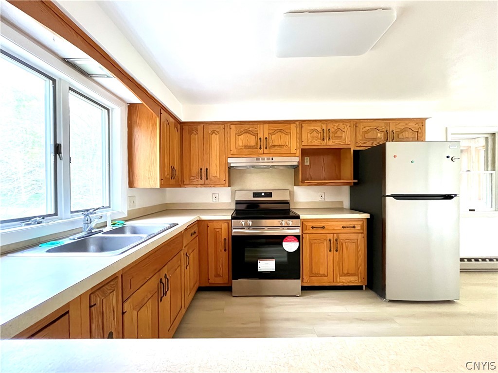 2002 Eno Road Sterling, NY 13111 - Photo 14 of 26 The kitchen has nice solid oak cabinets!