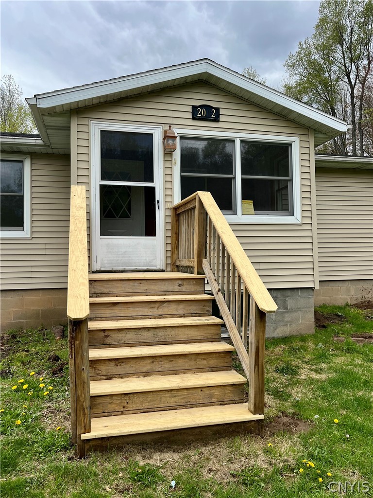 2002 Eno Road Sterling, NY 13111 - Photo 4 of 26 New Deck added to the Enclosed Front Porch!