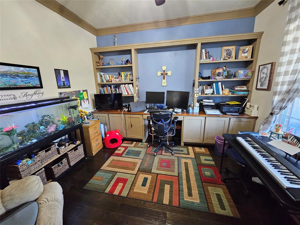 217 Heather Lane Decatur, TX 76234 - Photo 6 of 20 a room with furniture toys and a bookshelf