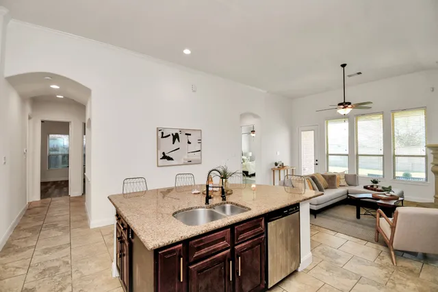 a bathroom with a sink toilet and mirror