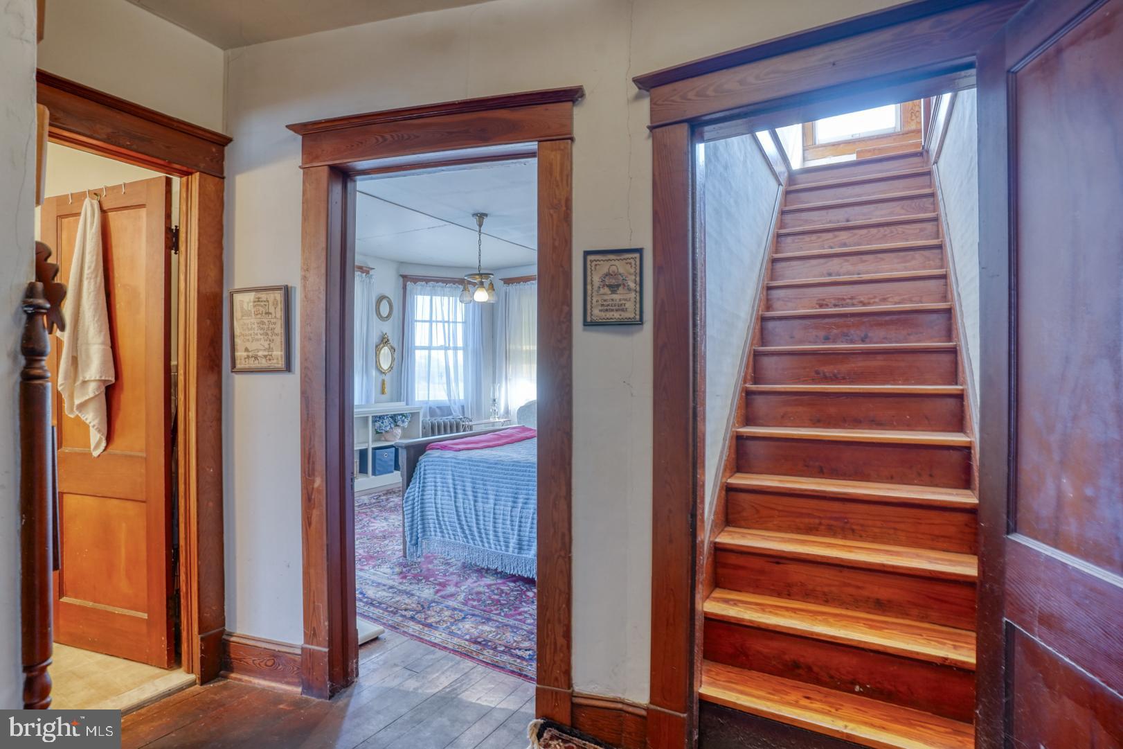 4096 Main Street Trappe, MD 21673 - Photo 56 of 70 a view of a hallway with wooden floor and windows