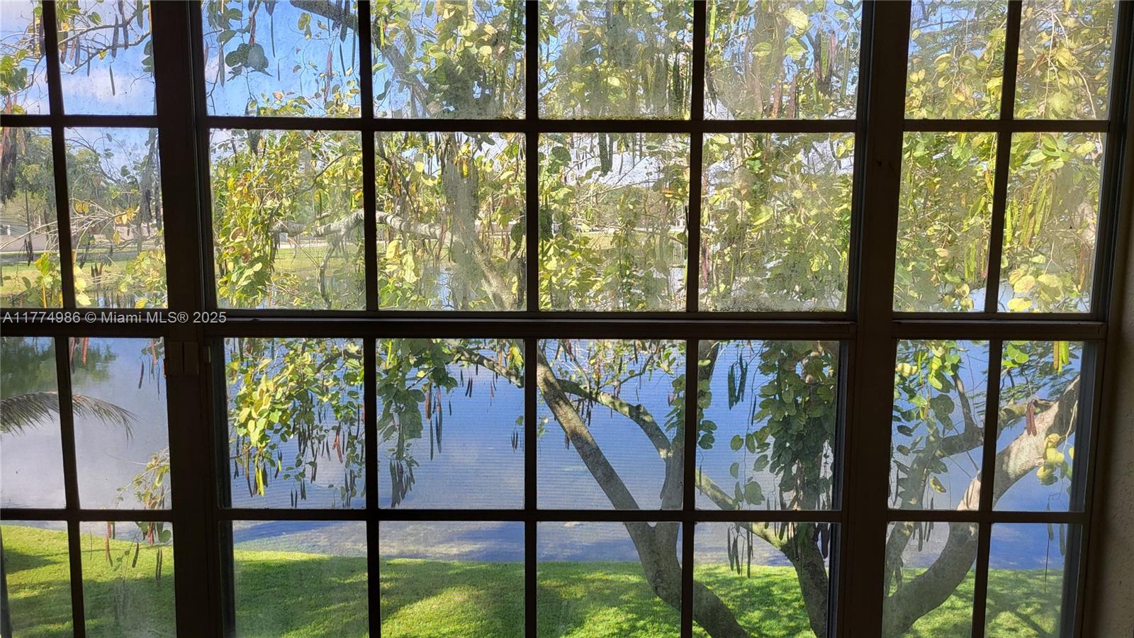 715 Southwest 148th Avenue, Unit 604 Sunrise, FL 33325 - Photo 11 of 29 Water View from Living Room