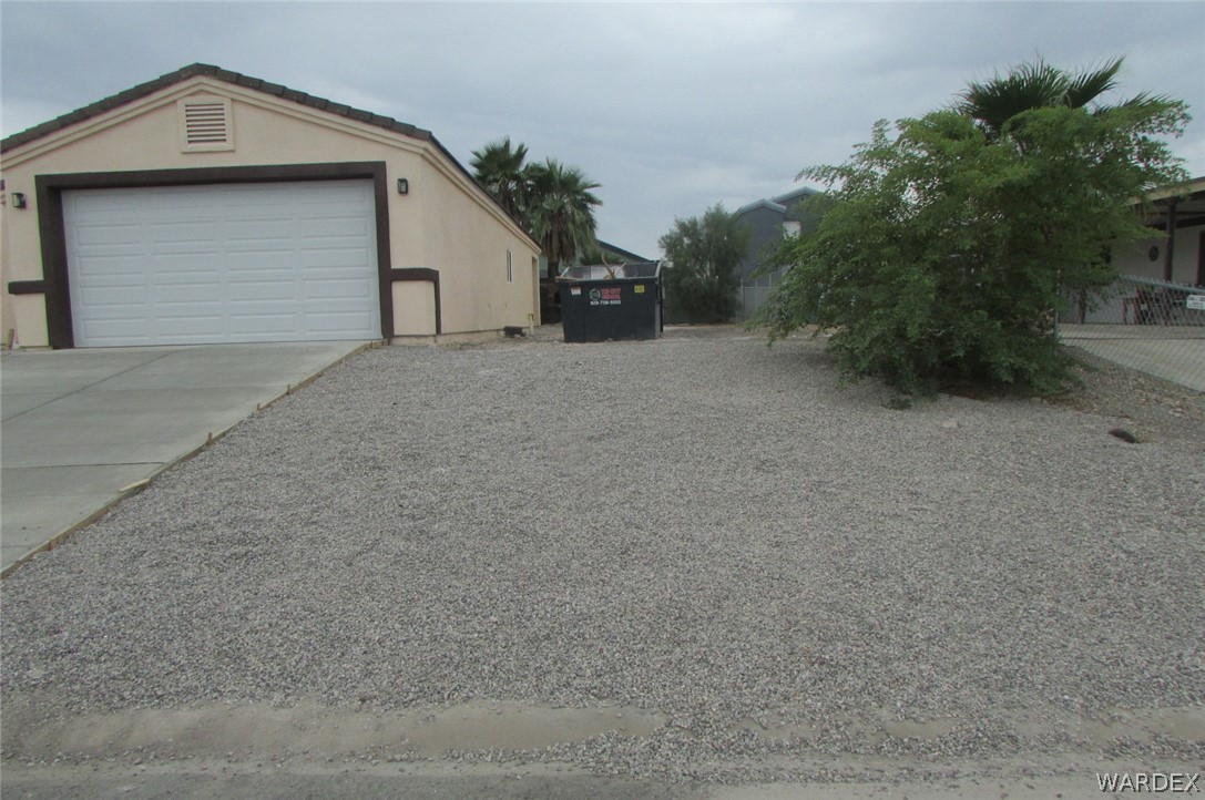 836 Ramar Road Bullhead City, AZ 86442 - Photo 3 of 10 a view of a house with a outdoor space