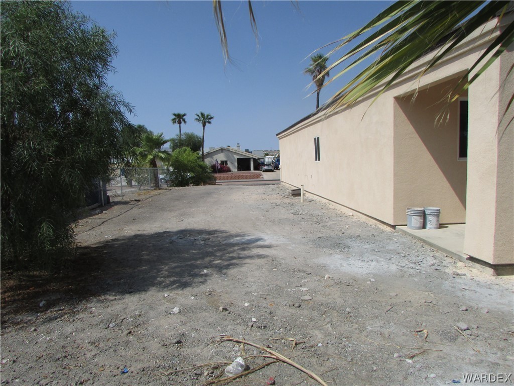 836 Ramar Road Bullhead City, AZ 86442 - Photo 9 of 10 a view of a house with a yard