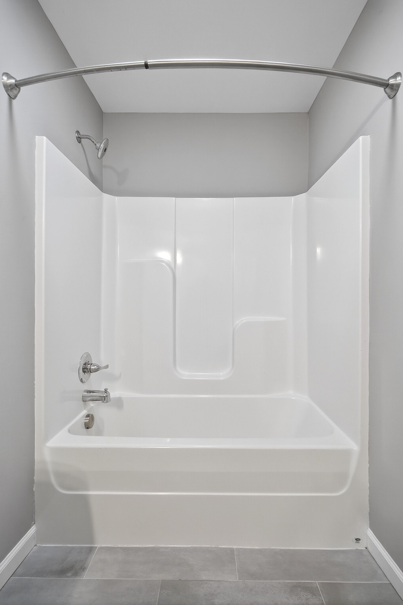 409 Buffalo Valley Road Baxter, TN 38544 - Photo 19 of 29 a bathroom with a bathtub and a shower