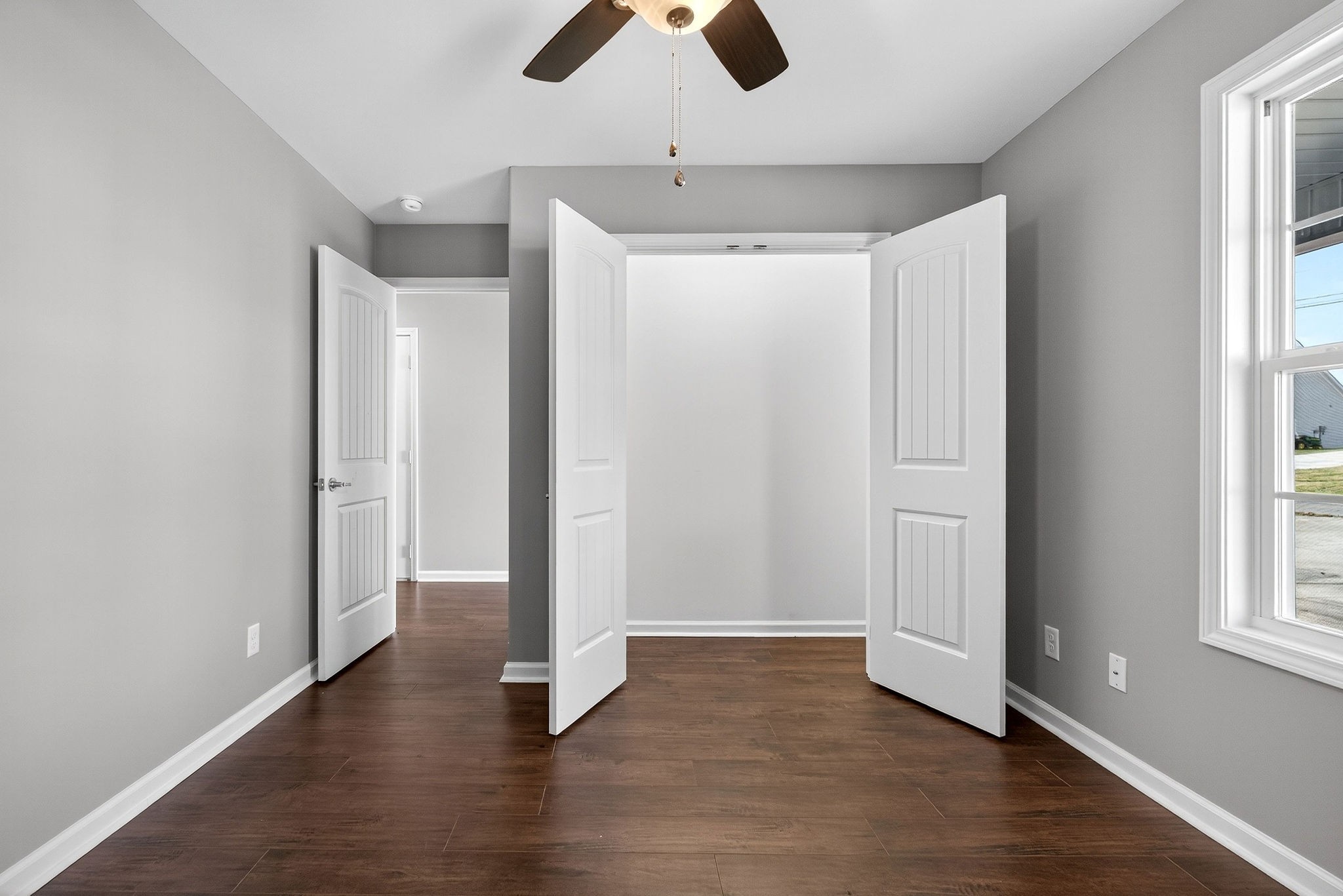 409 Buffalo Valley Road Baxter, TN 38544 - Photo 21 of 29 wooden floor in an empty room with a window