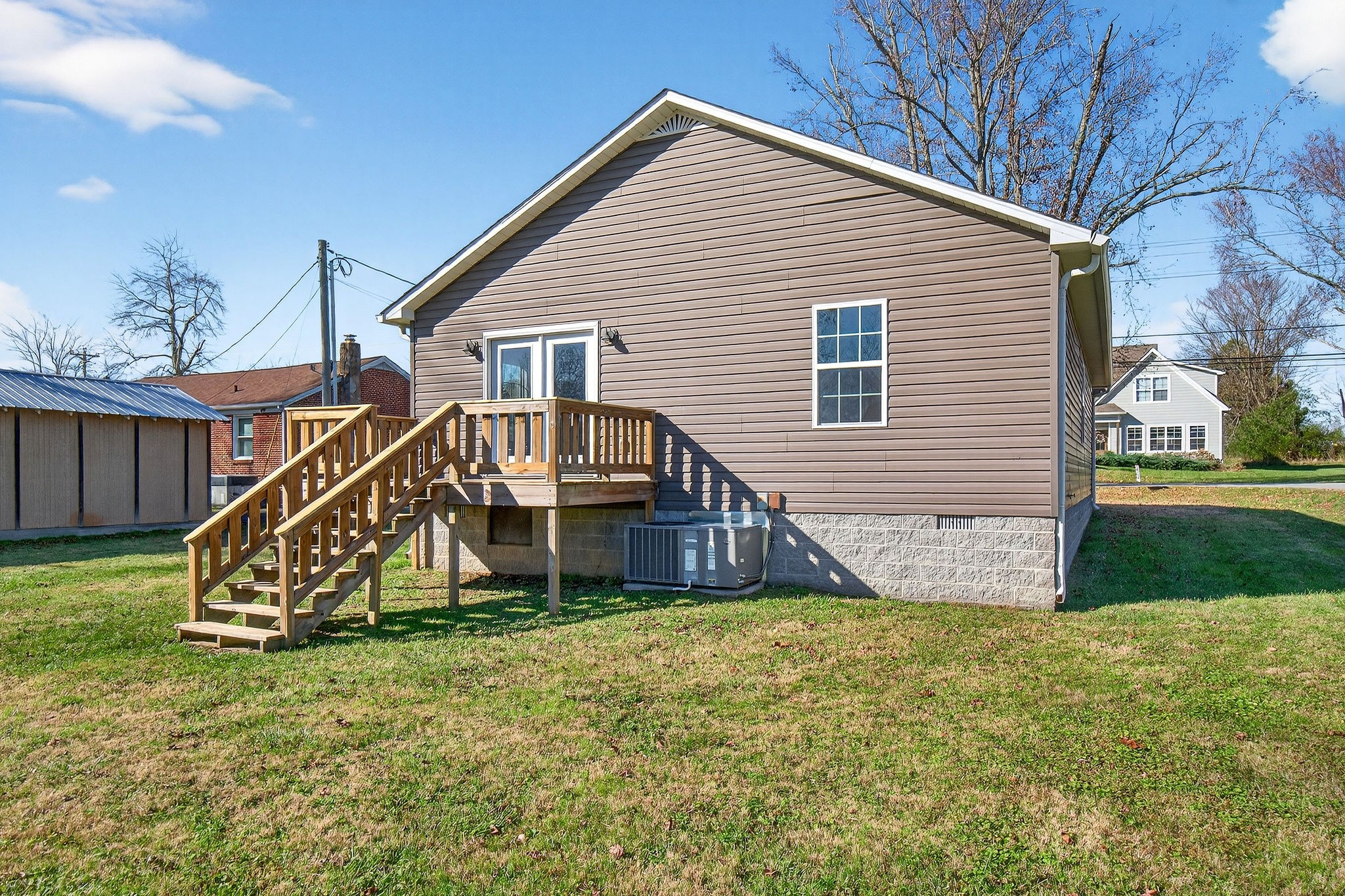 409 Buffalo Valley Road Baxter, TN 38544 - Photo 26 of 29 a view of a house with a yard