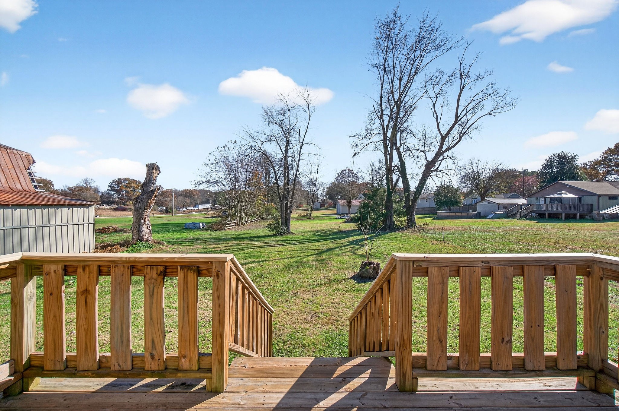 409 Buffalo Valley Road Baxter, TN 38544 - Photo 29 of 29 a view of a deck with a yard