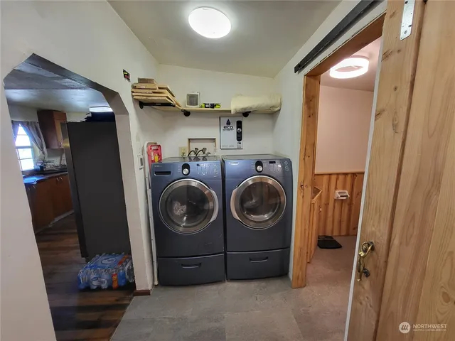 a utility room with dryer and washer