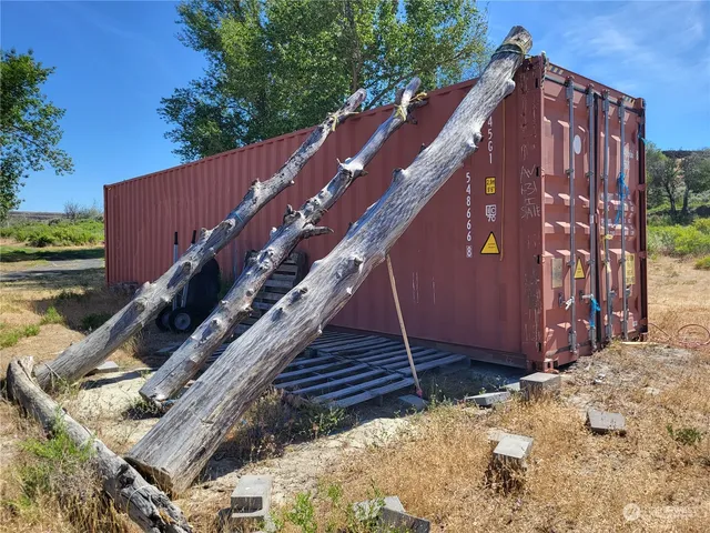 a view of a house with wooden stairs
