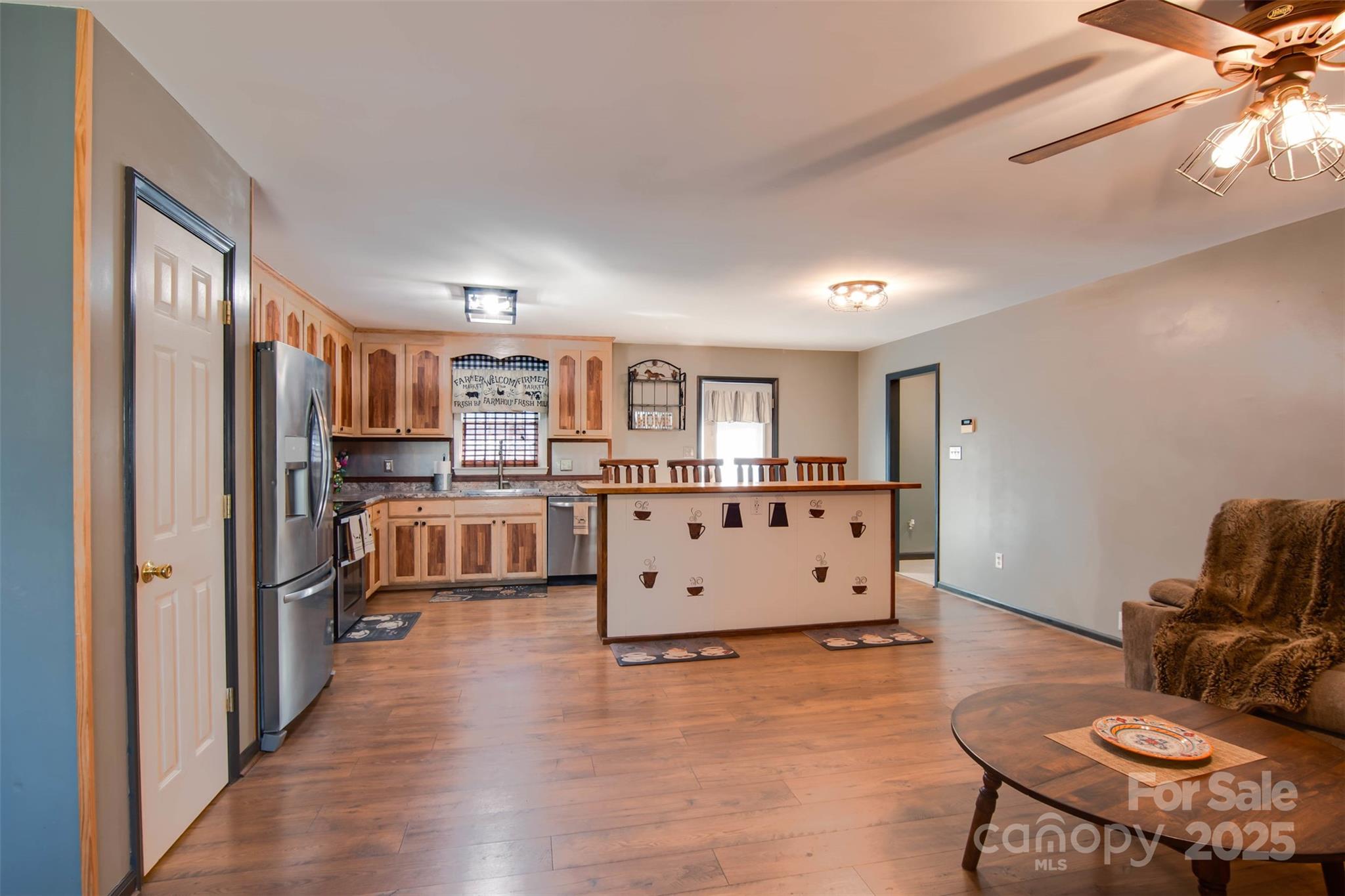 806 East Ridge Street Kings Mountain, NC 28086 - Photo 12 of 38 a living room with furniture and a wooden floor