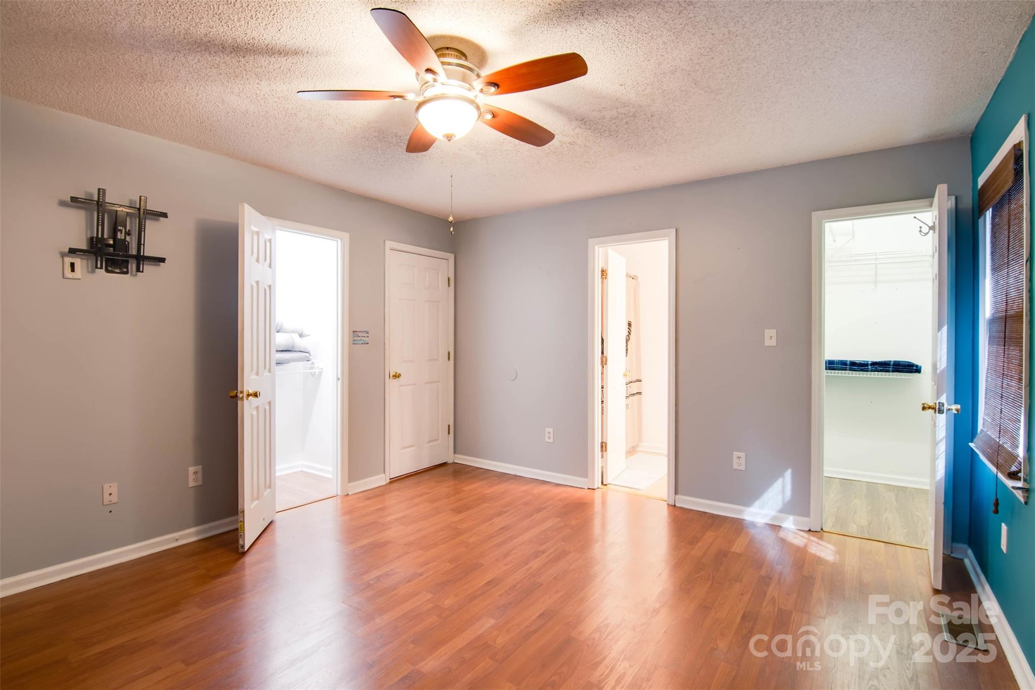 806 East Ridge Street Kings Mountain, NC 28086 - Photo 22 of 38 wooden floor in an empty room with a window