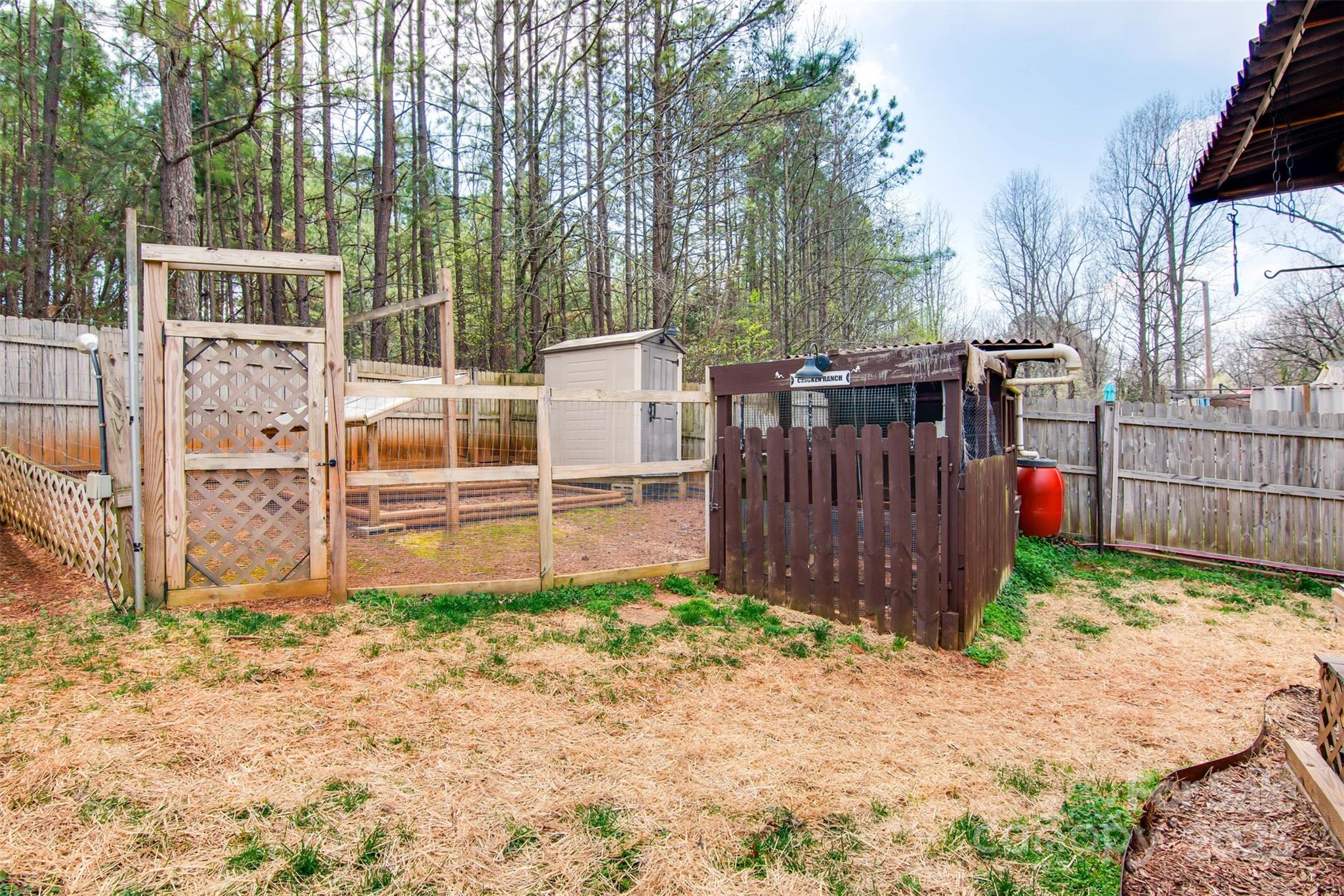 806 East Ridge Street Kings Mountain, NC 28086 - Photo 30 of 38 a view of a backyard with wooden fence