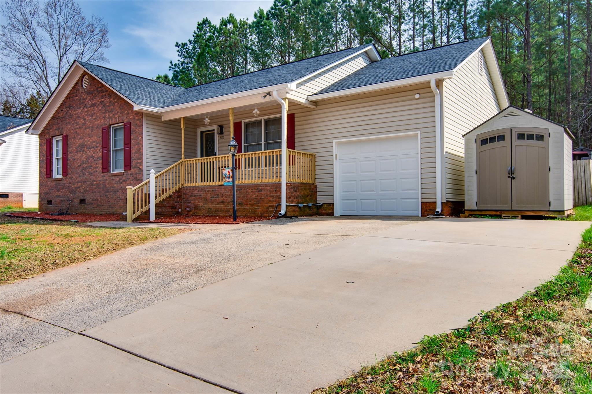 806 East Ridge Street Kings Mountain, NC 28086 - Photo 32 of 38 a front view of a house with a yard
