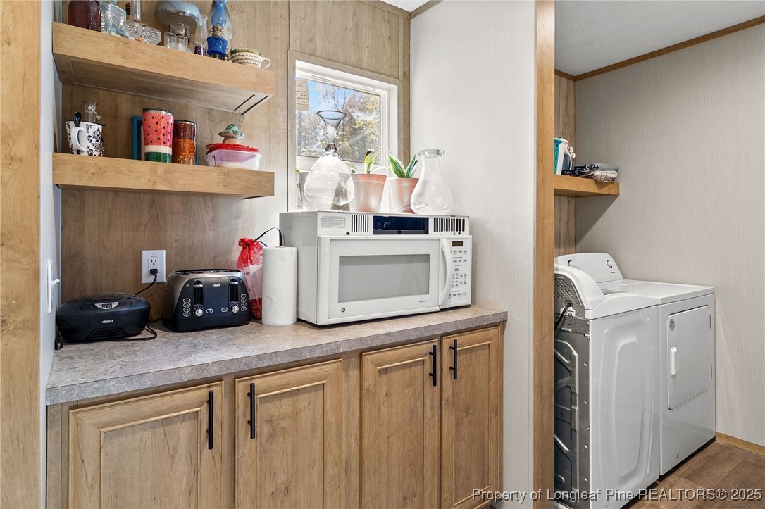 7096 Monarch Drive Linden, NC 28356 - Photo 11 of 31 a kitchen with a sink and cabinets