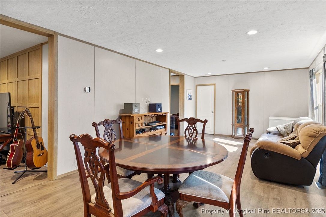 7096 Monarch Drive Linden, NC 28356 - Photo 12 of 31 a view of a dining room with furniture