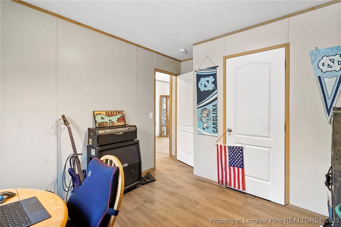 7096 Monarch Drive Linden, NC 28356 - Photo 23 of 31 a view of a workspace with furniture and a window