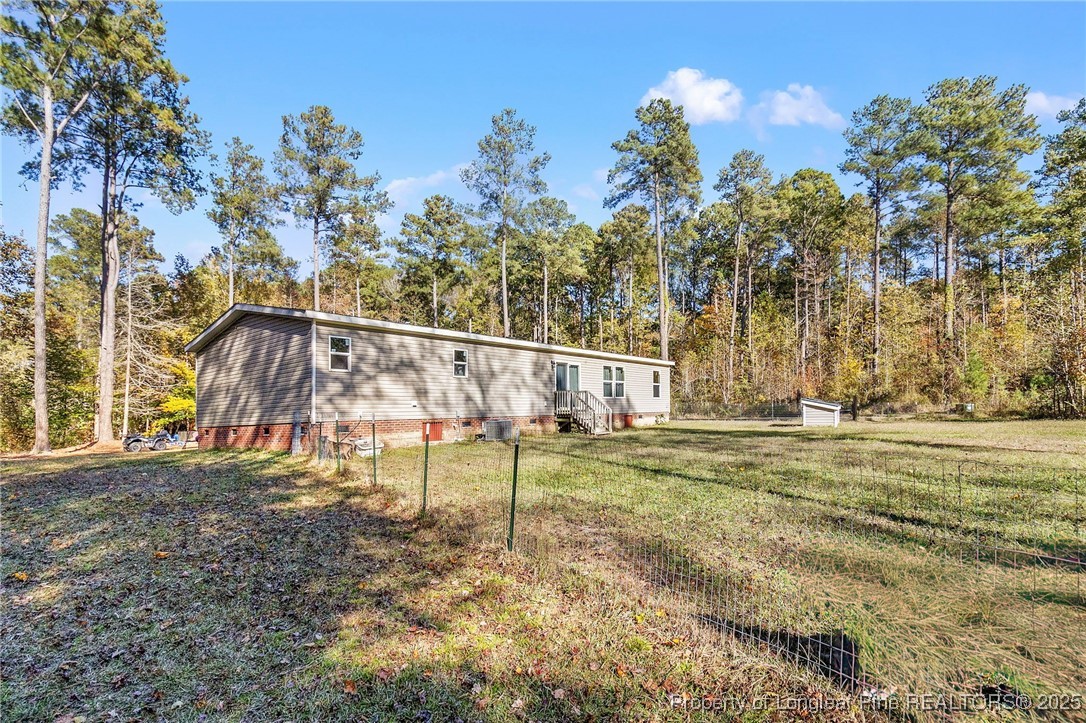 7096 Monarch Drive Linden, NC 28356 - Photo 31 of 31 a view of an outdoor space and yard