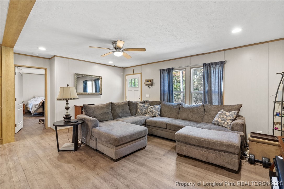 7096 Monarch Drive Linden, NC 28356 - Photo 5 of 31 a living room with furniture and a window
