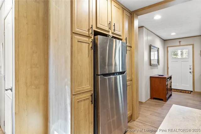 a view of walk in closet with window