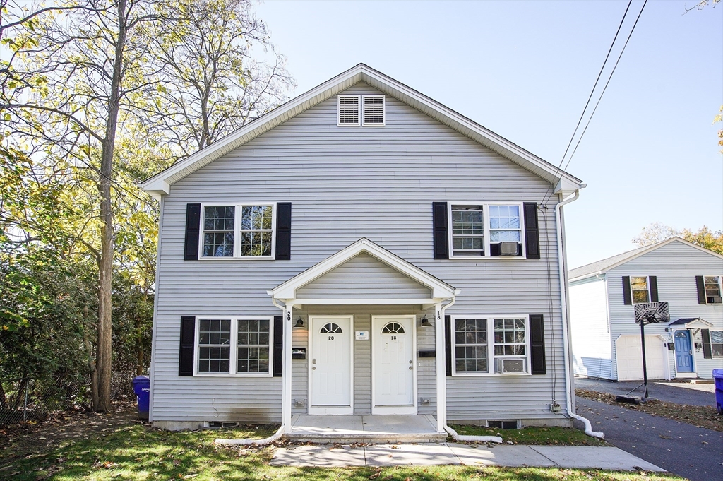 18-20 Healey Street, Unit 20 Springfield, MA 01151 - Photo 1 of 14 a front view of a house with garden
