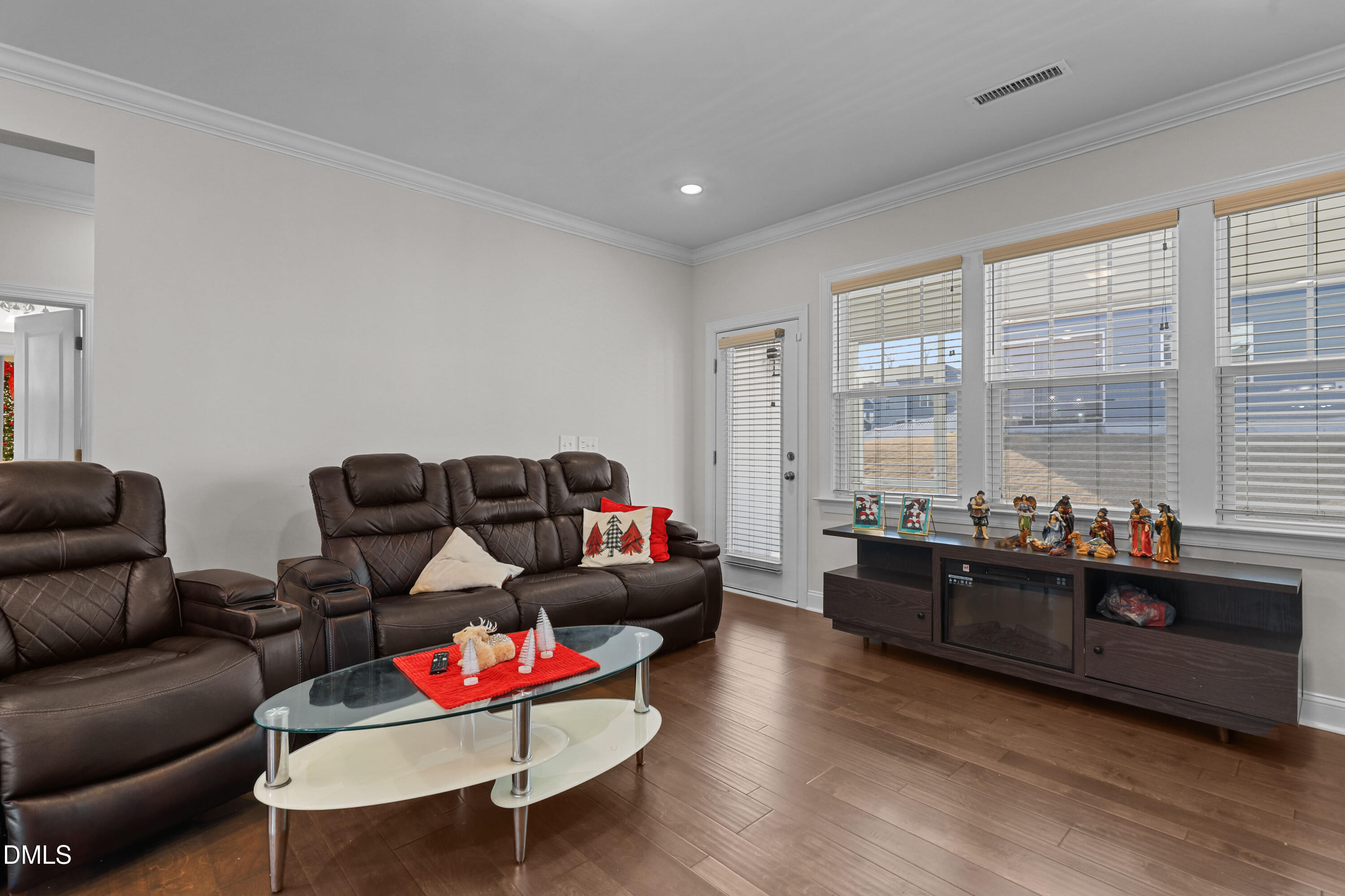 6117 Balance Court Raleigh, NC 27616 - Photo 13 of 44 a living room with furniture and a large window